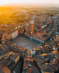 Naklejka premium Aerial View of Torre del Mangia and Piazza del Campo at Sunset, Siena, Tuscany, Italy