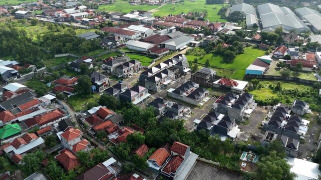 Aerial View of Residential Housing Complexes and Crowded Neighborhoods in Indonesia