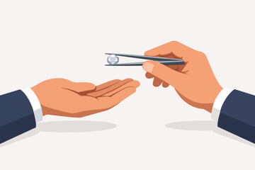 Jeweler giving diamond to client illustrating sale and appraisal of gemstones