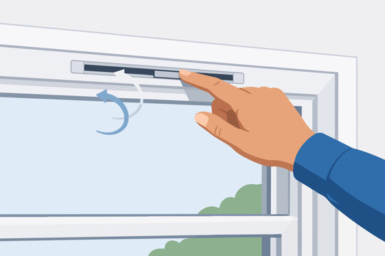 Hand adjusting trickle vent on window for ventilation, controlling indoor air flow