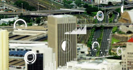 Obraz premium Rising tall beige office tower anchoring downtown, showing roads, ramps, rail tracks, vehicles, HUD