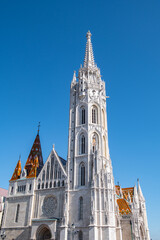 Fototapeta premium Matthias Church tower with colorful roof in Budapest Hungary