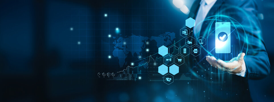 Consumer holding mobile checkout screen. Online payment enables fast, secure digital transactions through web and mobile platforms.