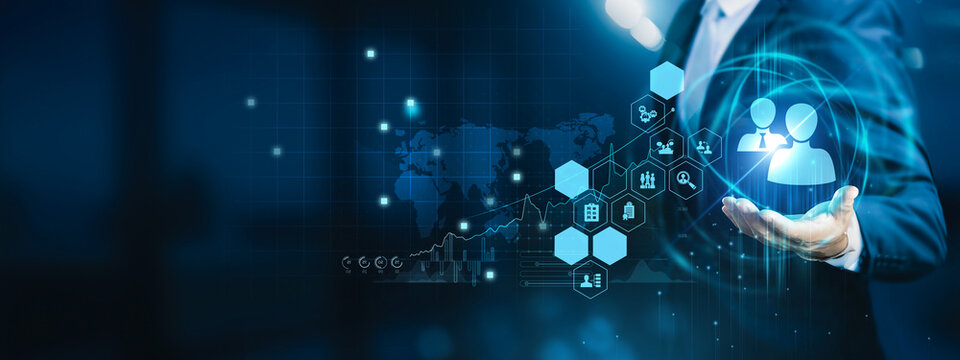 HR recruiter holding candidate profiles. Recruitment identifies, attracts, and hires qualified talent to support business growth.