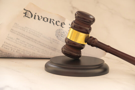 Divorce Decree and Judicial Gavel and Hammer Symbolizing Justice Law Courtroom Authority