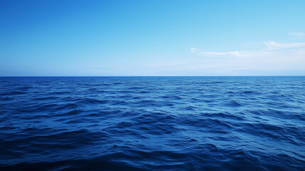 Obraz premium Blue sky over calm sea. Blue sea and sunny sky on horizon over calm water