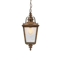 Fototapeta premium Outdoor Lantern Hanging in a Garden at Night Providing Light and Decoration