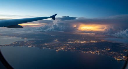 Fototapeta premium Aerial View of Sunset from Airplane Window.