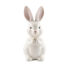 Obraz premium Ceramic Rabbit Holding Egg Sits on Shelf During Spring Season in a Home