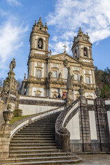 Curved Balustrade Surrounds Grand Stone Staircase. Gentle Curves And Sunlight Showcase Detailed Stone Details On Ancient Church Approach