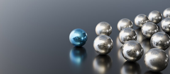 Leadership concept, blue leader ball leading silver balls, on black background with empty copy space on left side. 3D Rendering © Vlad Chorniy