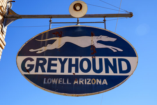 Lowell, Arizona - January 16, 2026: Old Grayhound bus logo on a vintage abandoned bus in the ghost town of Lowell, AZ, near Bisbee