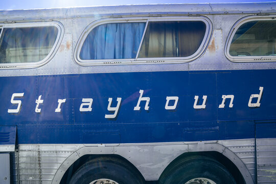 Lowell, Arizona - January 16, 2026: Old Grayhound bus logo on a vintage abandoned bus in the ghost town of Lowell, AZ, near Bisbee