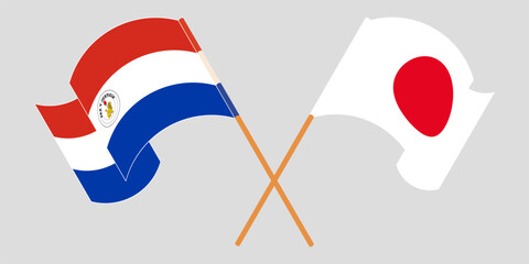 Crossed and waving flags of Republic of Paraguay and Japan. Vector illustration