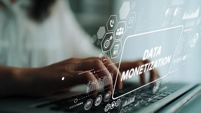 Hands Typing on Laptop with Digital Overlay Representing Data Monetization Concepts and Trends in Technology. Asymptotic smart data analytic.