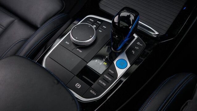 Automatic gear selector shifter on car center console close up