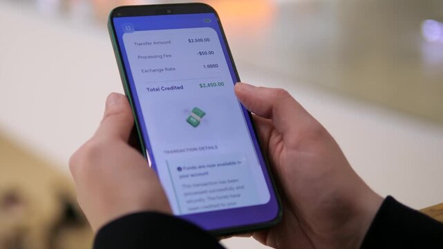 Modern digital banking in action: person reviews personal savings account transfer on a mobile phone. Clean, trendy fintech UI showing successful transaction and funds availability. Great for