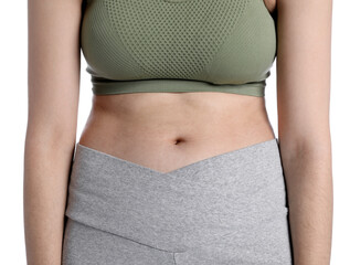 Woman in sportswear after weight loss on white background, closeup