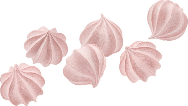 Falling pink meringue cookies isolated