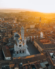 Obraz premium Aerial view of Siena Cathedral and historic city center at sunset, Tuscany, Italy
