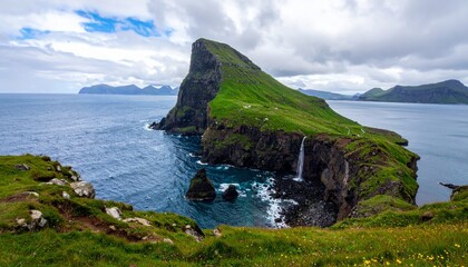 Dramatic coastal cliffs with waterfall plunging into ocean under cloudy sky faroe islands