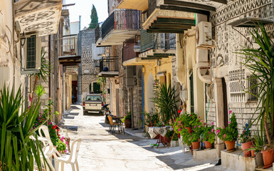 Chios Pyrgi Village Aesthetic: Narrow Street with Traditional Xysta Wall Paintings and Blooming Flowers, Geometric Ornaments on Greek Houses, Authentic Mediterranean Floral Alley 4K High Resolution