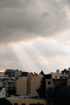 Sun rays breaking through clouds over Buenos Aires, Argentina 