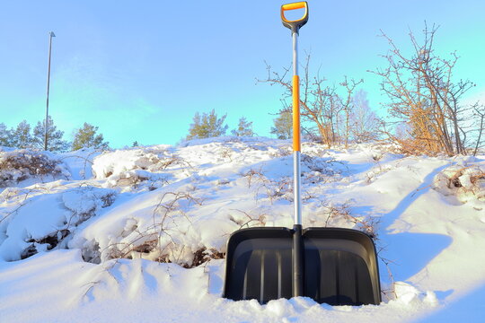 Snow shovel with very snowy nature. Winter day. Sweden 2026.