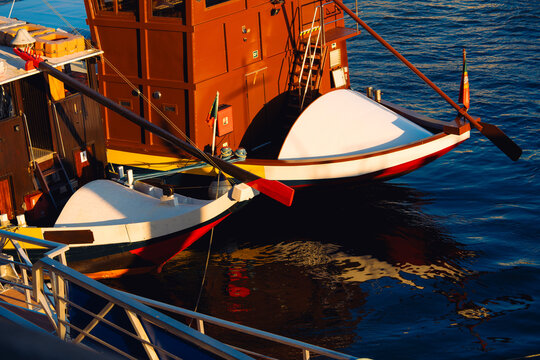 Traditional boat detail moored in golden hour light