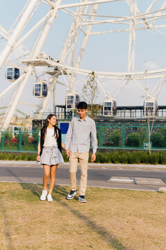 Couple Walk Hand in Hand