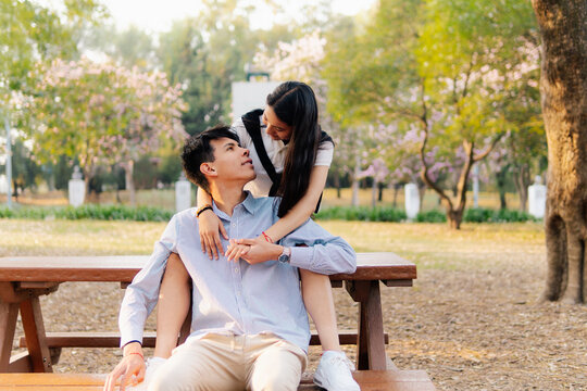 Couple Affectionate Hug Park Bench
