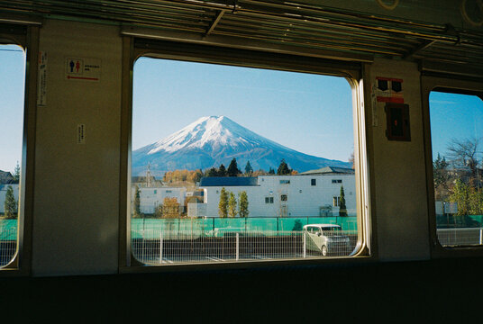 Scenic view of Fuji mountain peak visible from the train 