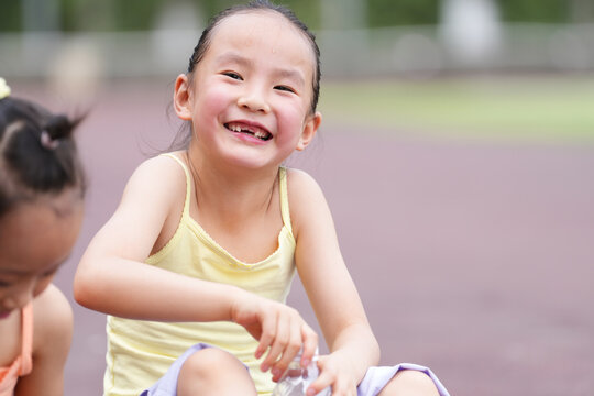 Child Laughing show the The front teeth have just grown in