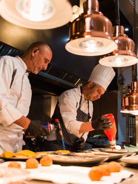 Chefs cooking together 