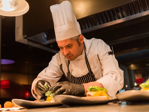 Passionate chefs making gourmet burgers 