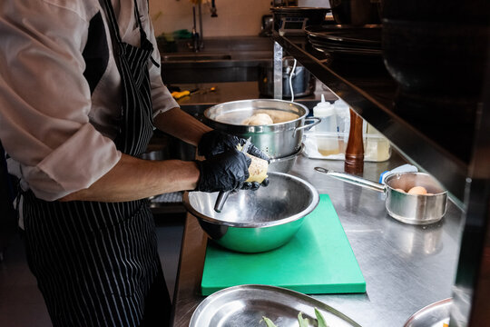 Cook peeling potato