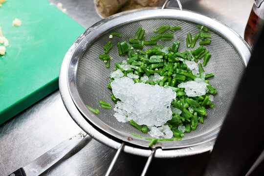 Fresh Green Beans Prepared With Ice for Crisp Texture in Kitchen