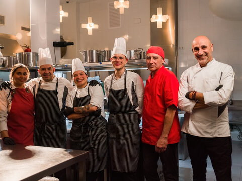 Group portrait of team in restaurant 