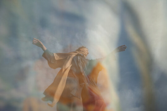 Dance in blue in the cloudy sky 