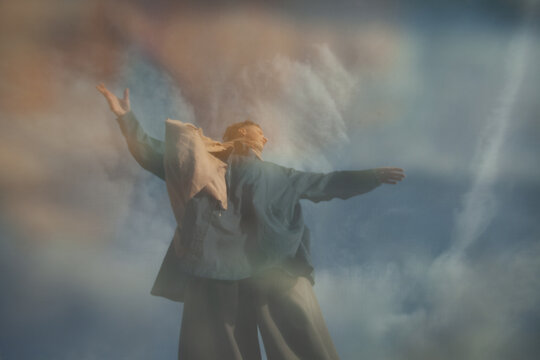 Dance in blue in the cloudy sky 