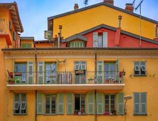 Obraz premium Mediterranean houses in terracotta colors with traditional shutters, Nice France