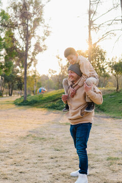Father Son Shoulder Ride Portrait