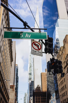 5th Avenue Street Sign with Urban Skyscrapers