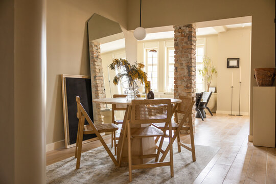 Cozy Dining Area With Natural Light and Modern Decor