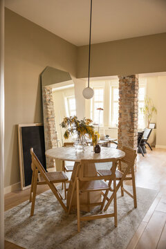 Modern Dining Area With Natural Light and Minimalist Design Features