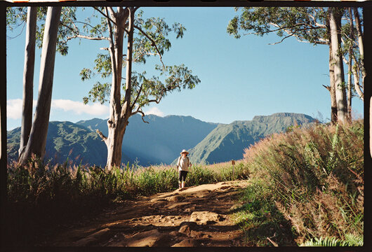 Woman hiking the Waihee Ridge Trail in Maui 