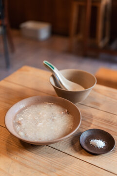 Warm Congee Served in a Cosy Dining Setting