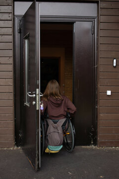 A woman drives into the door.