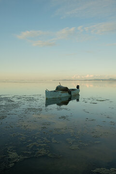 Fishing Boat on Calm Water