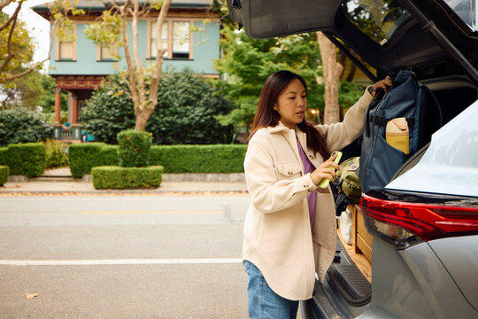 Woman gets ready for a road trip